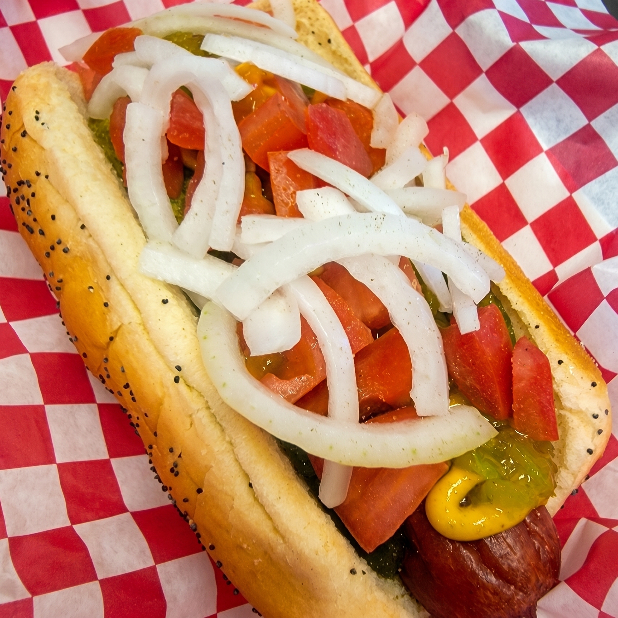 Chicago-style hot dog with traditional toppings from Colorado Corndog & Burger Company