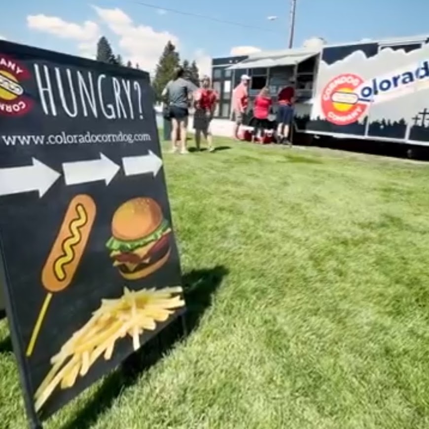 Colorado Corndog Company food truck serving customers at Art in the Park in Grand County, Colorado