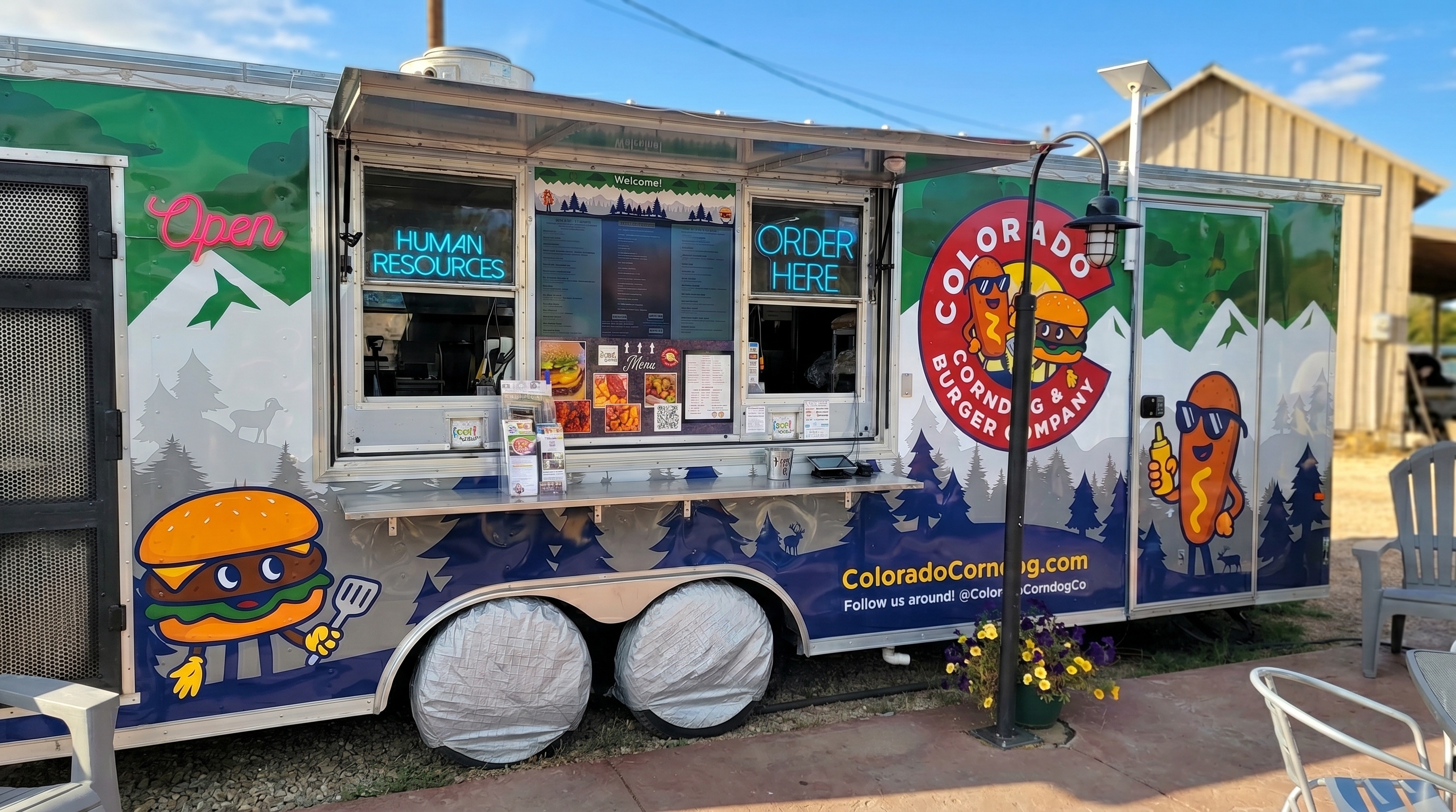 Colorado Corndog & Burger Company food truck in Fraser, Colorado featuring Cornelius and Burgess mascots