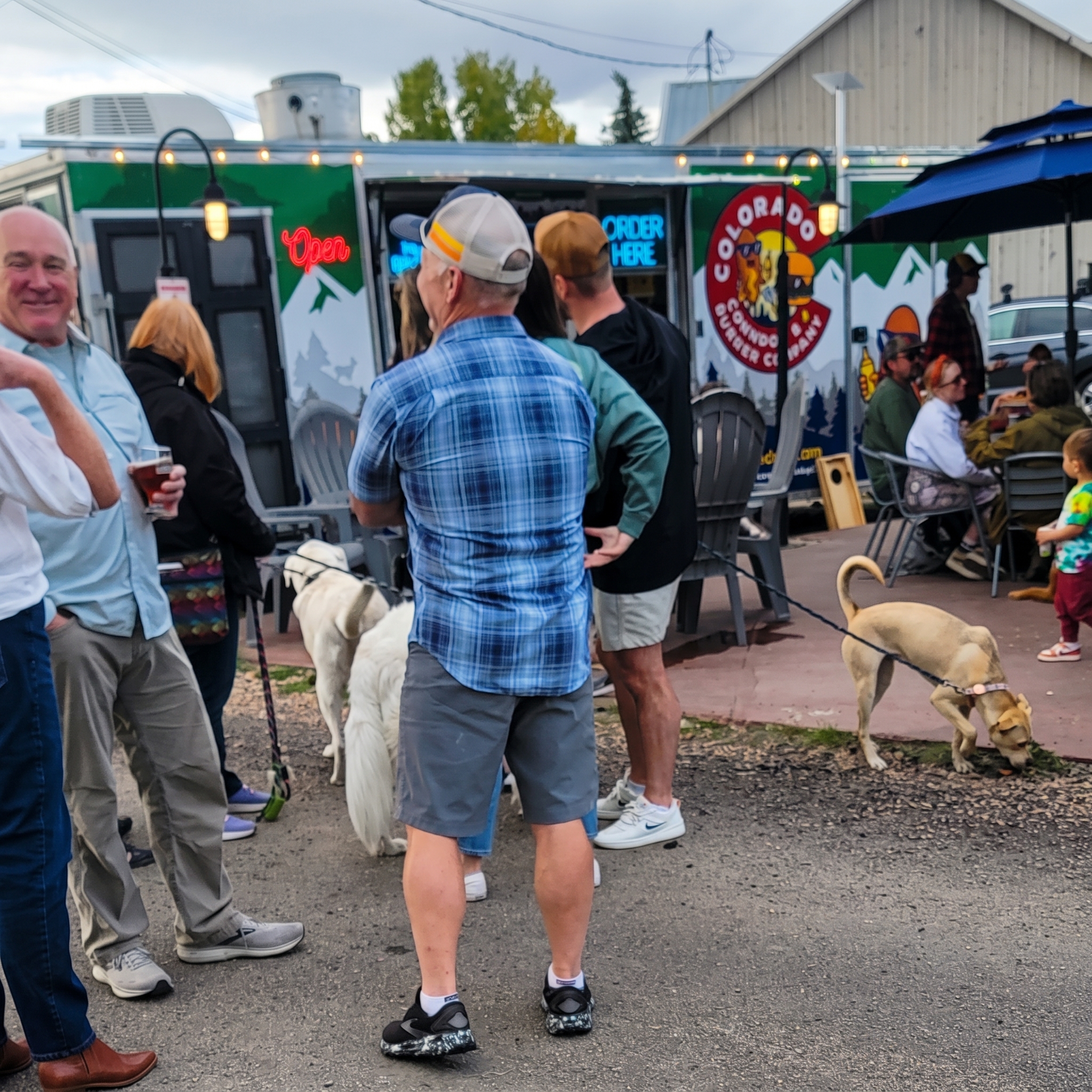 Customers gathered outside Colorado Corndog & Burger Company at Camber Brewing Company in Fraser, Colorado
